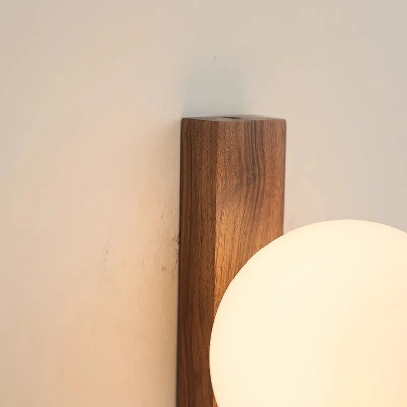 Aurora Lux Walnut Wood Wall Sconce With Glass Globe